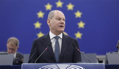 Germany’s Scholz urges EU to reform, strike migrants deal